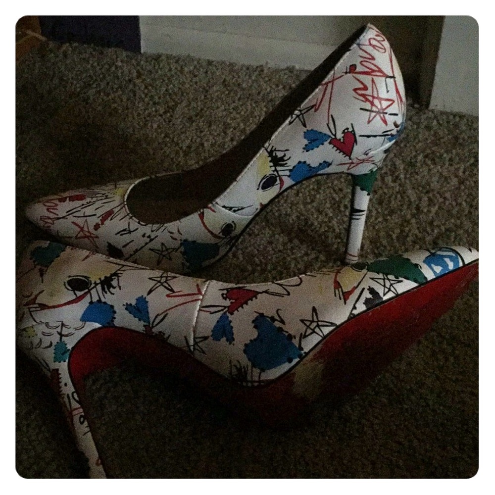 Paris themed 4 inch heel made in Italy leather.